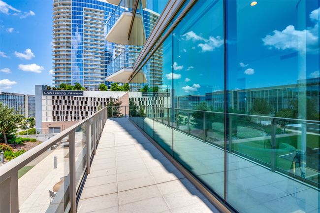 Balcony with a view of city | Image 28