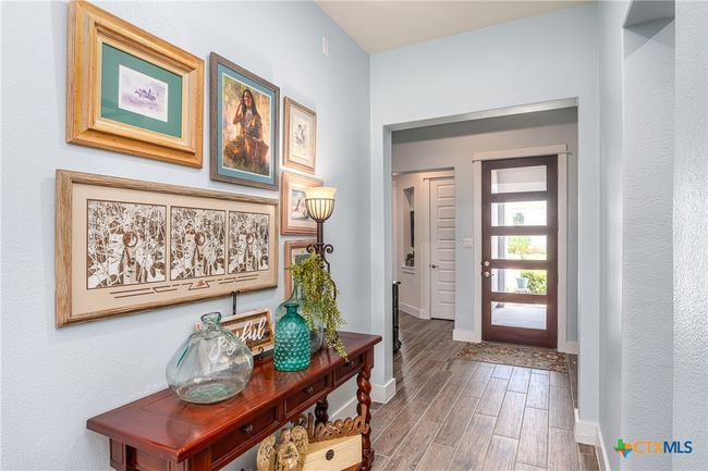 View of the hallway and foyer. | Image 6
