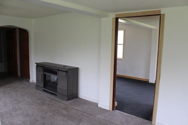 side view room and front room fireplace | Image 5