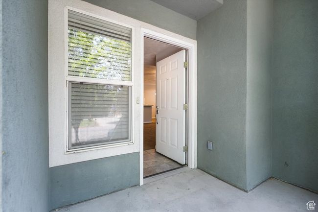 View of exterior entry featuring stucco siding | Image 4