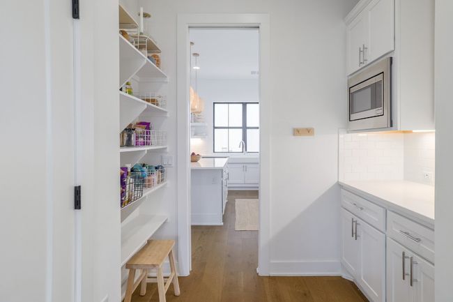 Butler's pantry with prep space and loads of storage | Image 11