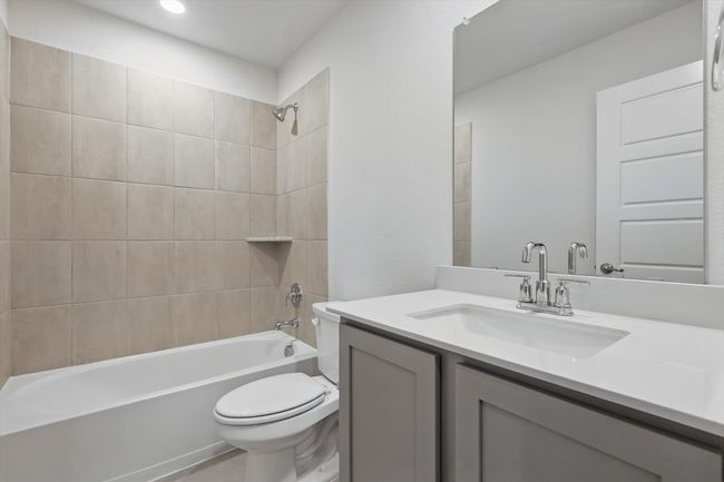 Full bath with vanity, bathtub / shower combination, and recessed lighting | Image 8