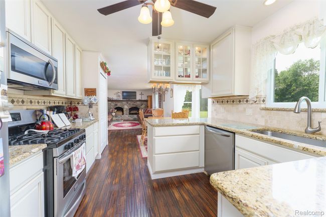 Kitchen looking into family room | Image 11