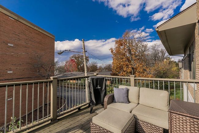 Upstairs deck off family room. | Image 41