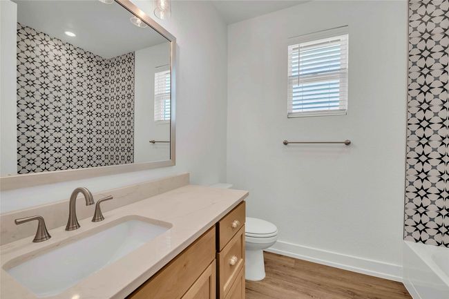 Please Note: These interior photos are not of the actual design, but are of a completed design with a similar floor plan. Finishes, features, and layouts may vary. | Image 16
