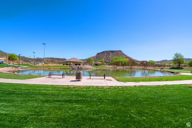 View of property's community with a yard, a water and mountain view, and a gazebo | Image 76