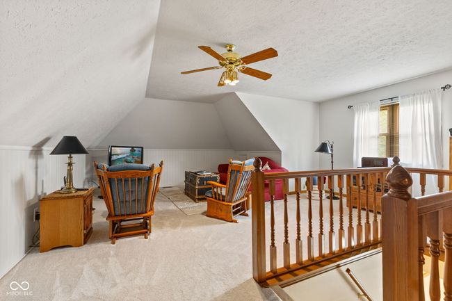 Upper level Bonus Room with closet off back staircase. Could be 4th bedroom. | Image 27