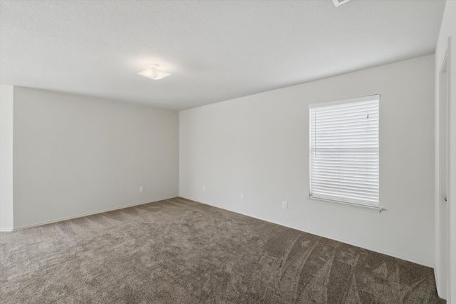 Spare room featuring carpet floors | Image 20