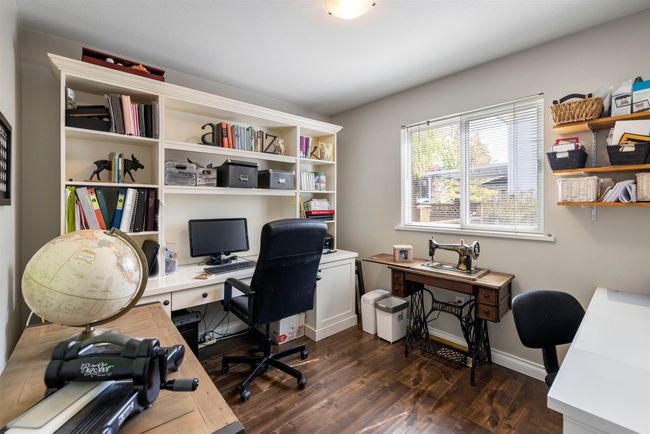 Office space featuring baseboards and dark wood-style floors | Image 13