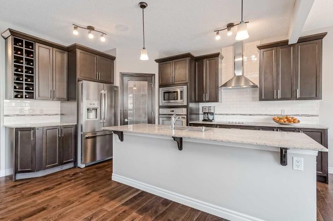 168 Cougar Ridge Manor Sw, Home with 4 bedrooms, 3 bathrooms and 4 parking in Calgary AB | Image 3