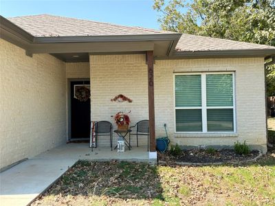 Entrance to property with a patio area | Image 2