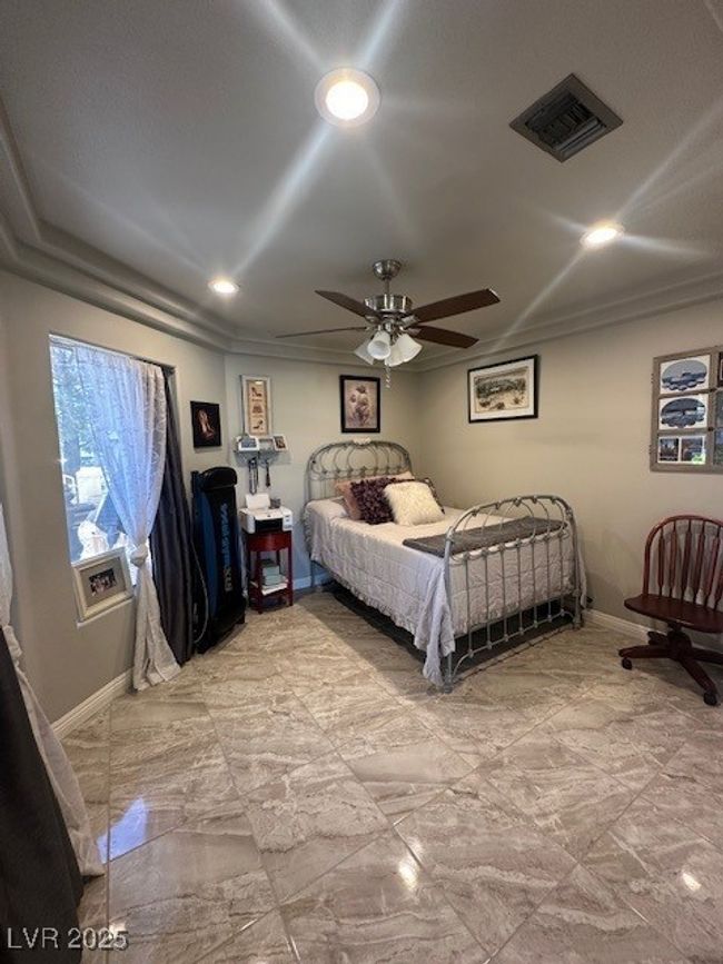 Bedroom with ornamental molding, recessed lighting, and ceiling fan | Image 7