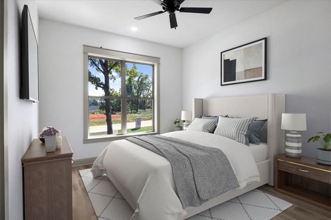 Bedroom with wood finished floors, ceiling fan, and recessed lighting | Image 26