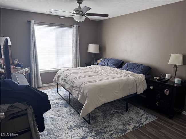 Master bedroom with walk in closet. | Image 17