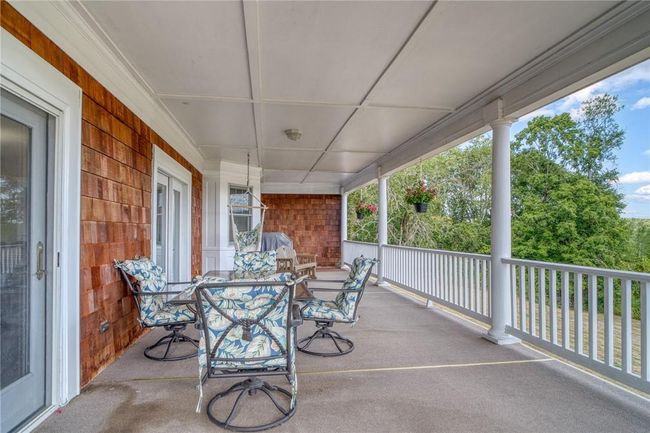 View of patio / terrace featuring covered porch | Image 4