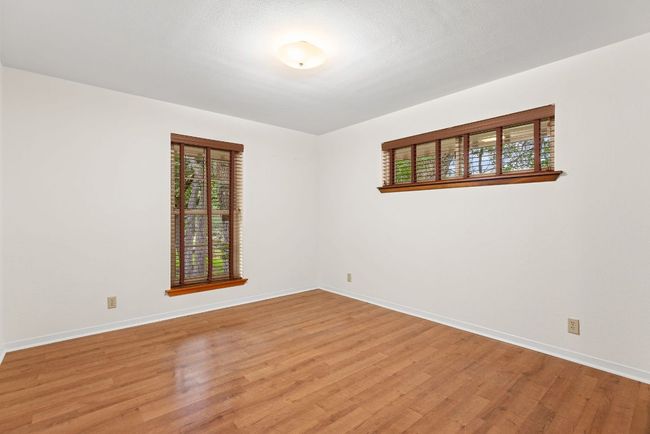 Empty room featuring light wood finished floors | Image 19
