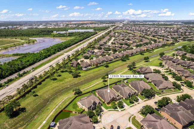 Wonderful aerial shot of this gorgeous home with no back neighbors on this quiet cul-de-sac street in the Shadow Creek Ranch community. | Image 36