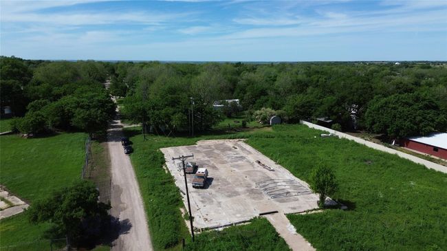 Birds eye view of property featuring a forest view | Image 18