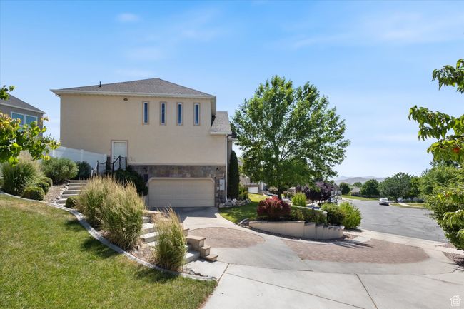 View of side of property with driveway and basketball standard. | Image 32