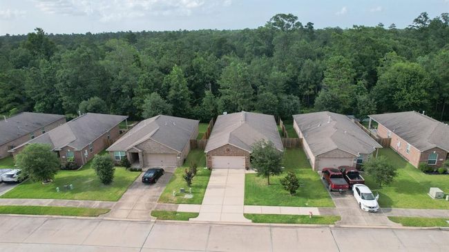 7551 Fettle Ln, House other with 3 bedrooms, 2 bathrooms and 2 parking in Conroe TX | Image 42
