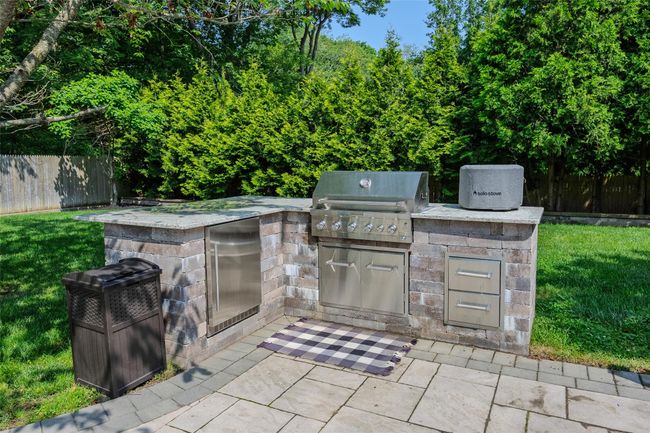 View of patio / terrace featuring an outdoor kitchen | Image 45