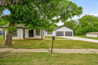 View of front of property with a garage and a front lawn | Image 3