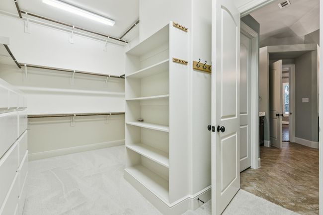 Primary bedroom walk in closet | Image 19