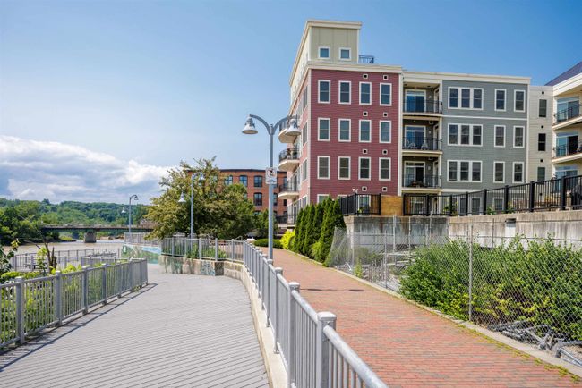 UNIT-1409 - 60 Winooski Falls Way, Condo with 2 bedrooms, 2 bathrooms and null parking in Winooski VT | Image 36