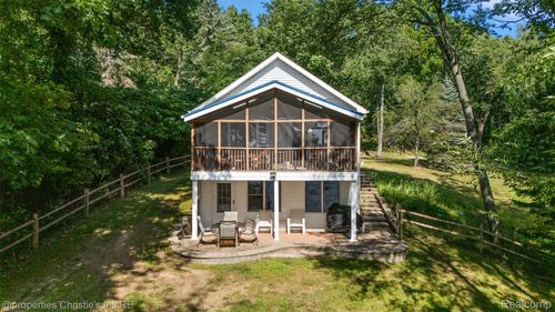 11113 Perch Lake Dr W, Cement City, MI, 49233-9658 | Card Image