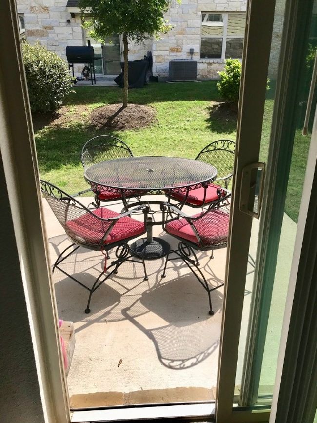 View of patio featuring area for grilling and outdoor dining area | Image 14