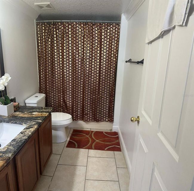 5406 Crepe Myrtle Cir, House other with 4 bedrooms, 3 bathrooms and null parking in KISSIMMEE FL | Image 29