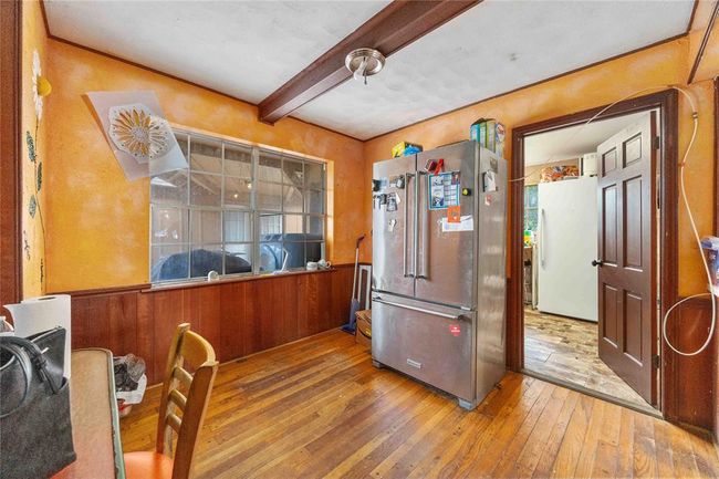 The breakfast room currently holds the fridge because it is too talk to fit in the kitchen slot. | Image 8