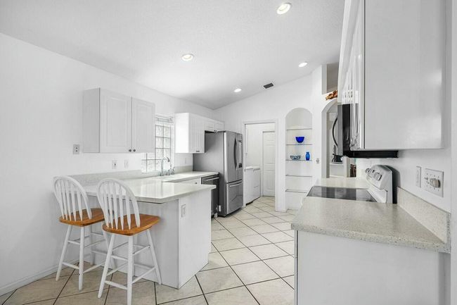 1643 Oak Berry Cir, House other with 3 bedrooms, 2 bathrooms and null parking in Wellington FL | Image 6