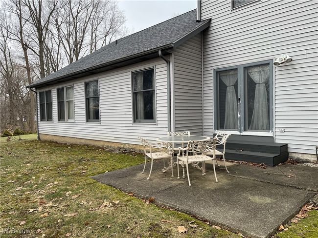 Doors off Kitchen lead to the Backyard | Image 43
