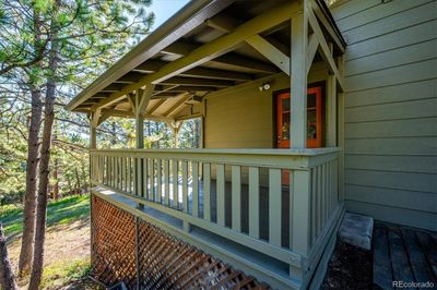 large covered deck off off of the kitchen and dining area | Image 3