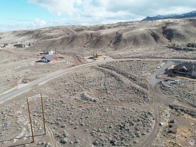 View of rural area with a mountain backdrop and a desert landscape | Image 9