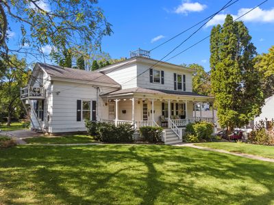 122 Fremont Street, Home with 5 bedrooms, 4 bathrooms and 8 parking in Woodstock IL | Image 2