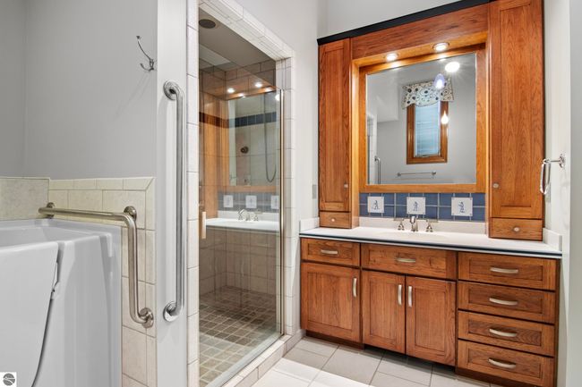 4173 Dornoch Ct, House other with 6 bedrooms, 4 bathrooms and null parking in Williamsburg MI | Image 58
