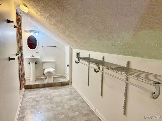 Upstairs bathroom with closet. | Image 44