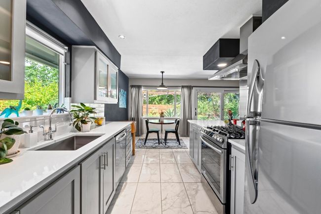 The gorgeous interior has been meticulously cared for and updated over time. This masterpiece is not your average investor flip. | Image 9