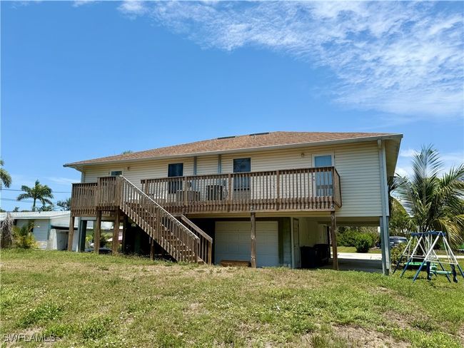 5615 Birdsong Ln, Home with 4 bedrooms, 2 bathrooms and null parking in BOKEELIA FL | Image 5