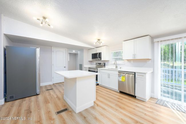 101 Tall Pine Trl, House other with 3 bedrooms, 2 bathrooms and null parking in SATSUMA FL | Image 11