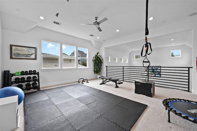 Loft/flex area on second level featuring ceiling fan, recessed lighting, and carpet flooring | Image 18