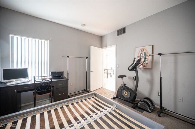 Home office with carpet flooring and visible vents | Image 27