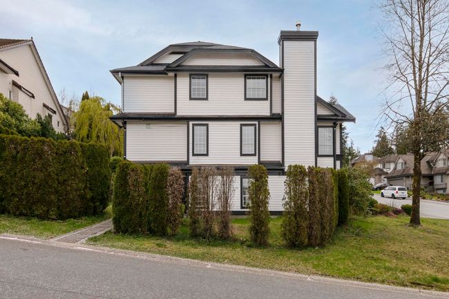 Back of house featuring a chimney | Image 39
