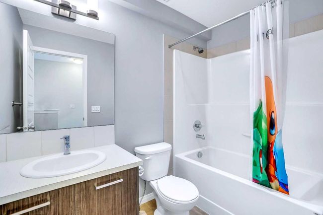 201 - 70 Saddlestone Dr Ne, Townhouse with 2 bedrooms, 3 bathrooms and 1 parking in Calgary AB | Image 18