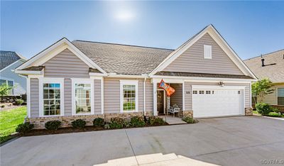 View of front of property with a garage | Image 1