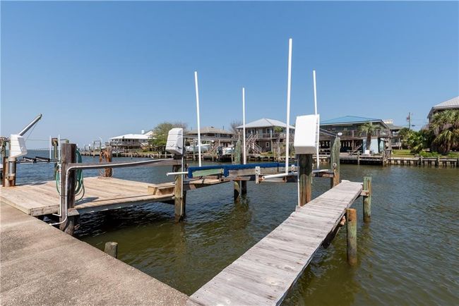 View of dock with boat lift and a water view | Image 19