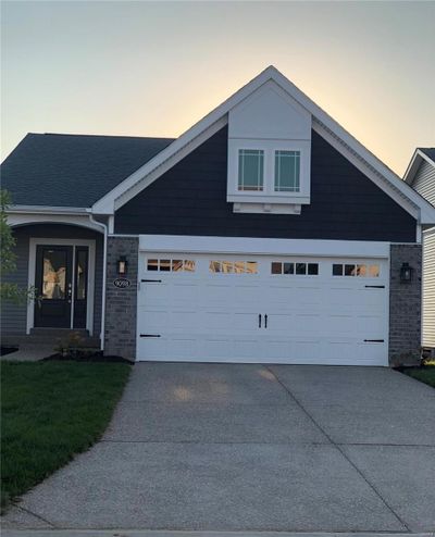 View of front of house with a garage | Image 1