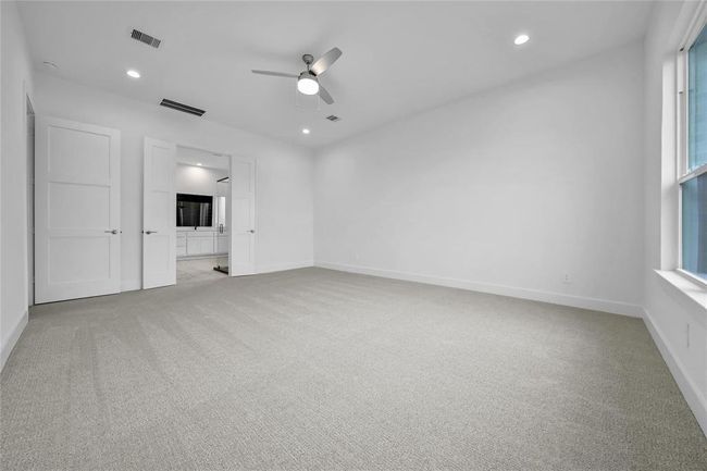 Spacious primary suite. | Image 25